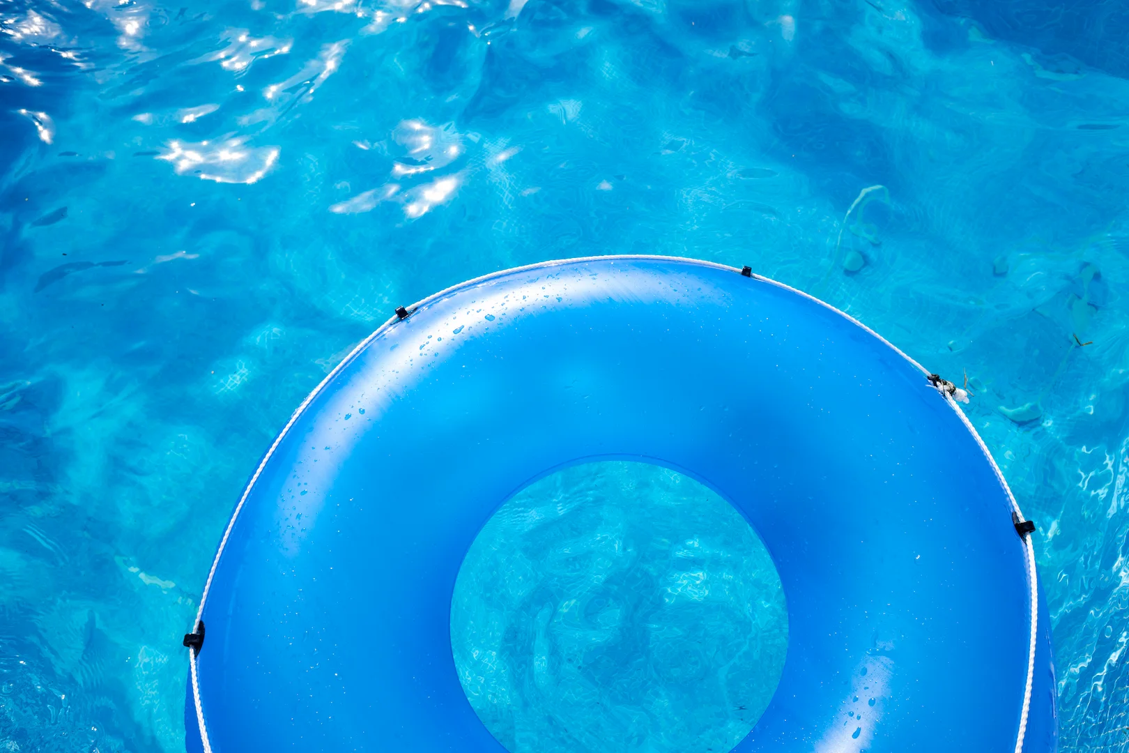 inflatable plastic ring floating above a pool on a 2022 05 03 21 37 02 utc